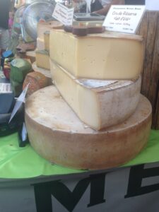 Cheese wheels in a market South West France
